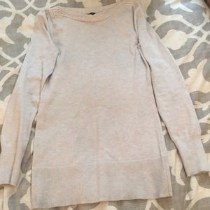 Tan long sweater with braided detail on neck